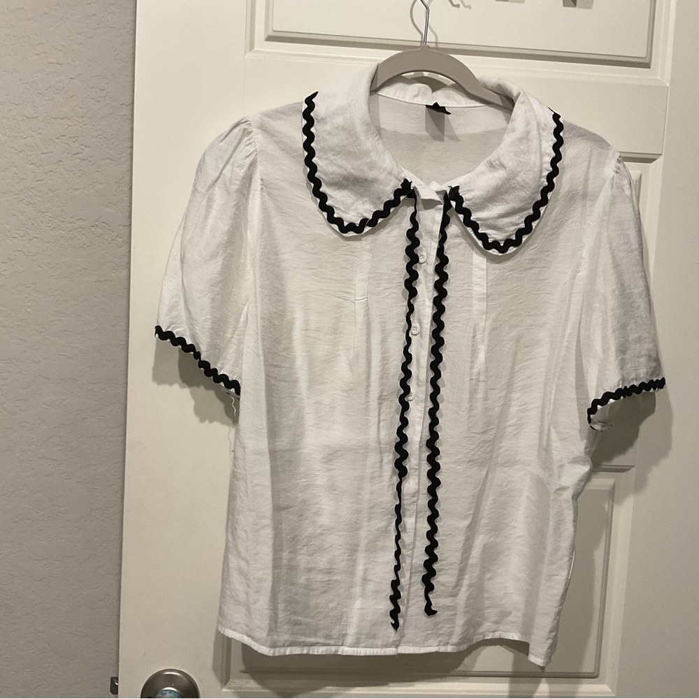 White Blouse with Black Trim
